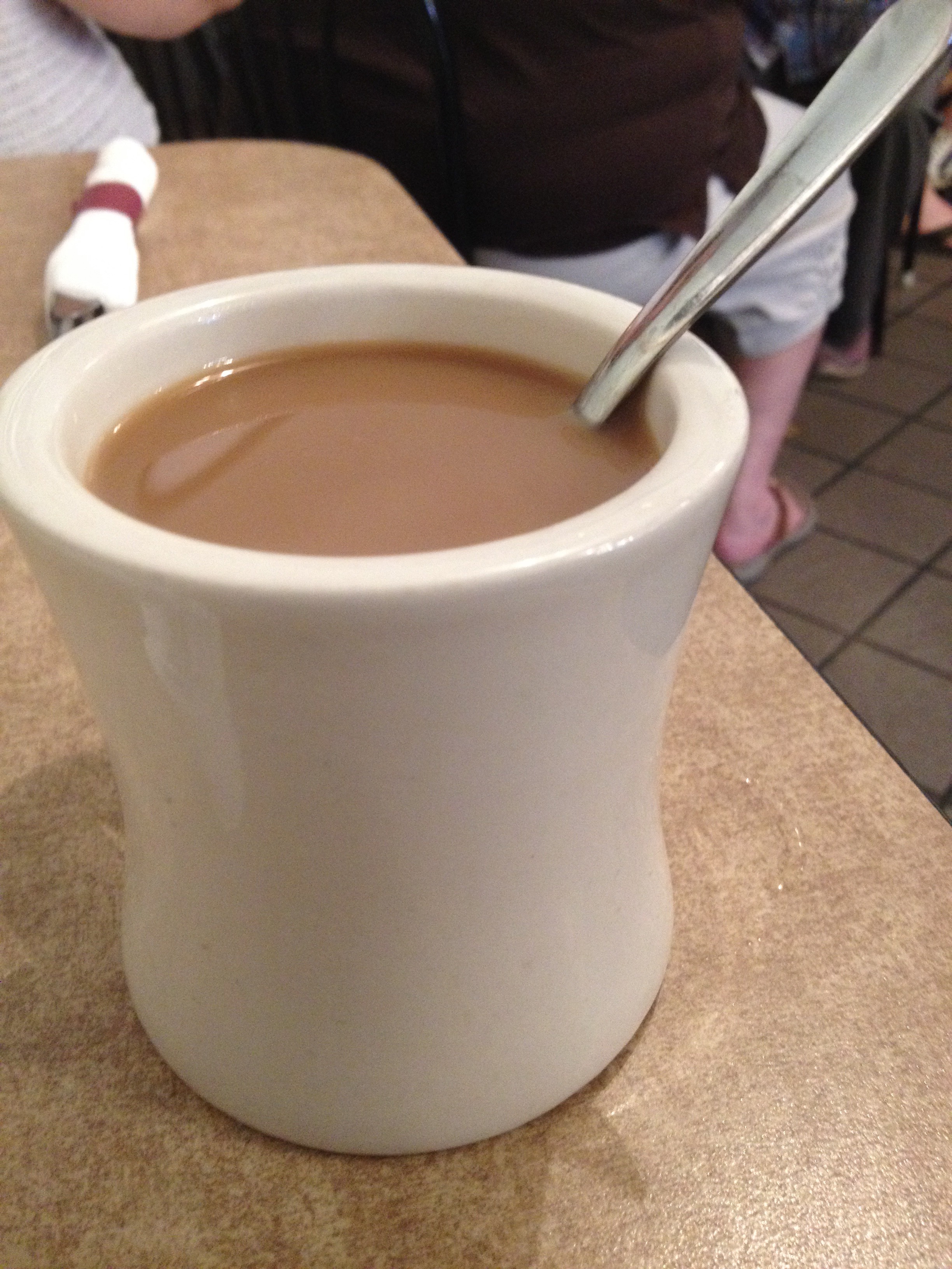 Photo showing a delicious cup of hot, decaf coffee